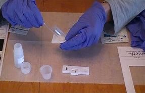 Methamphetamine residue surface sampling being carried out in a property